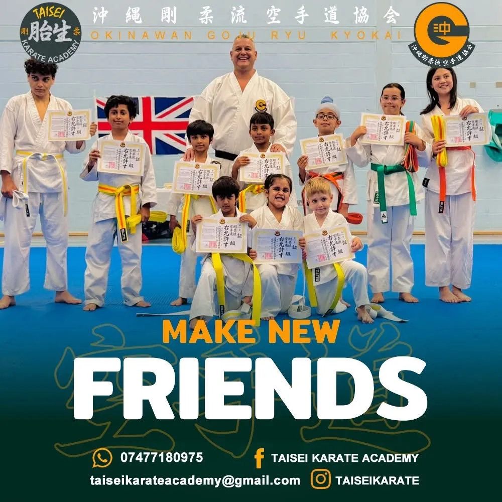 Sensei Daniel Jagemberg with a second group of students holding their grading certificates