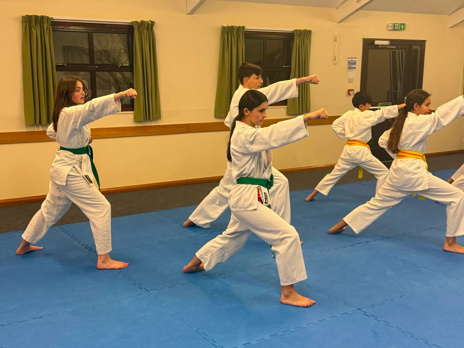 Kids practising a punching drill together